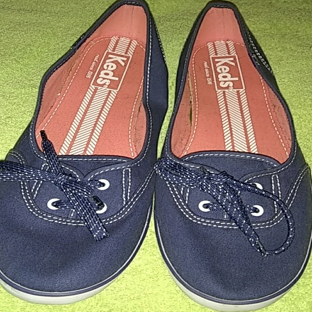 A blue and white slip on sneaker